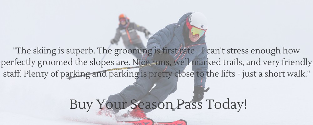 Image of a skier in a blue coat with text"The skiing is superb. The grooming is first rate - I can't stress enough how perfectly groomed the slopes are. Nice runs, we'll marked trails, very friendly staff. Plenty of parking and parking is pretty close to the lifts - just a short walk."